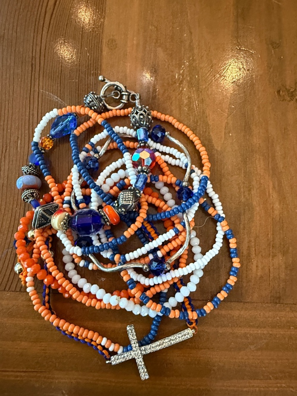 Beaded Cross Charm Bracelet — Orange, Blue & White
